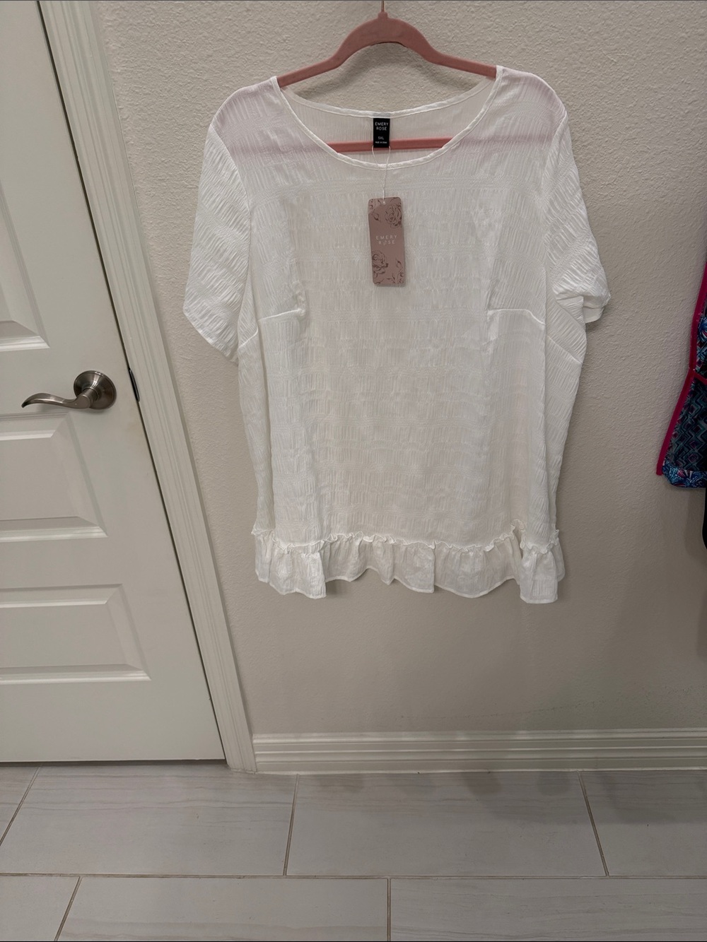 Relaxed White Textured Ruffle-Hem Blouse